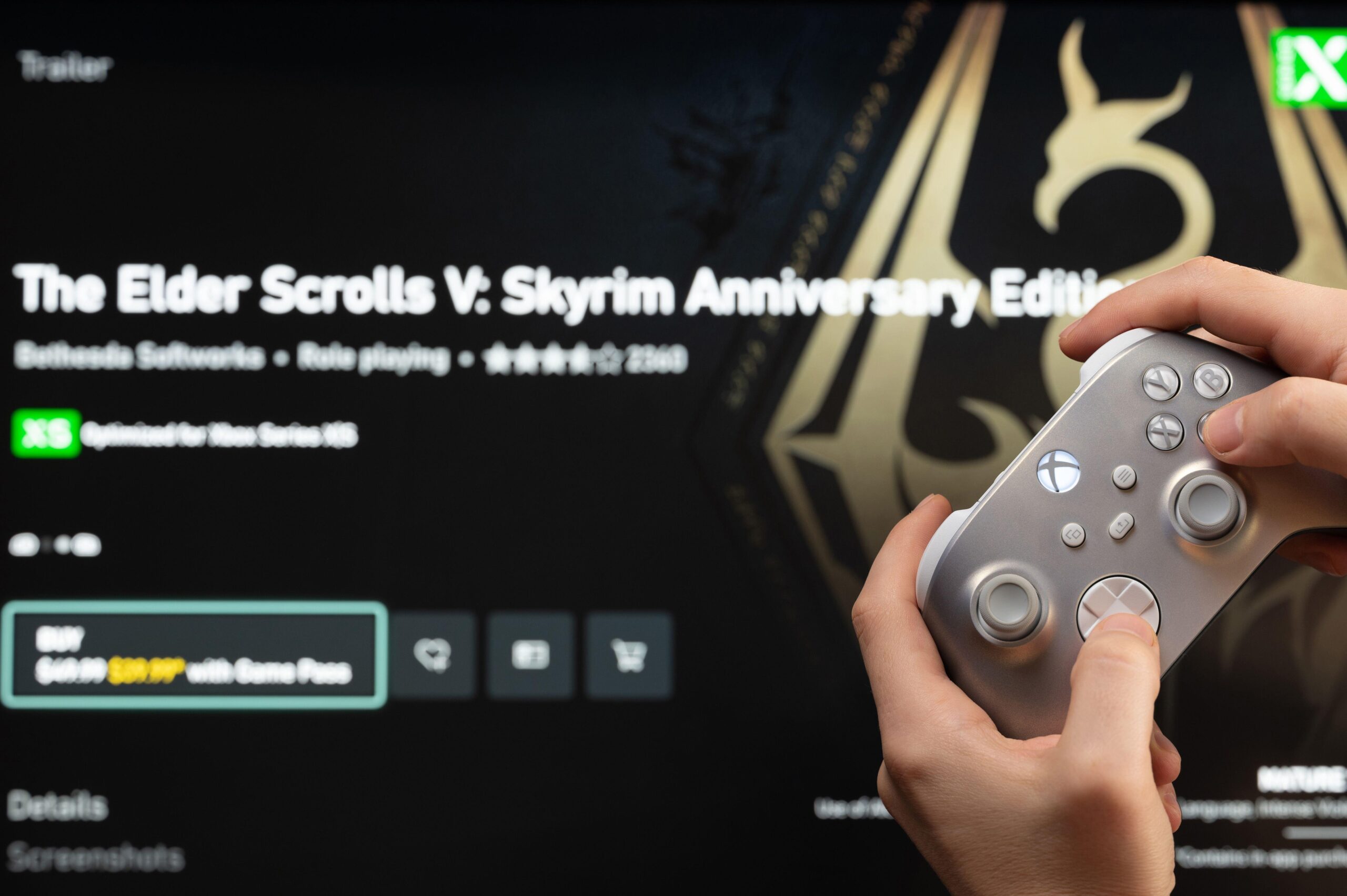a person playing Skyrim, Anniversary Edition on their X Box