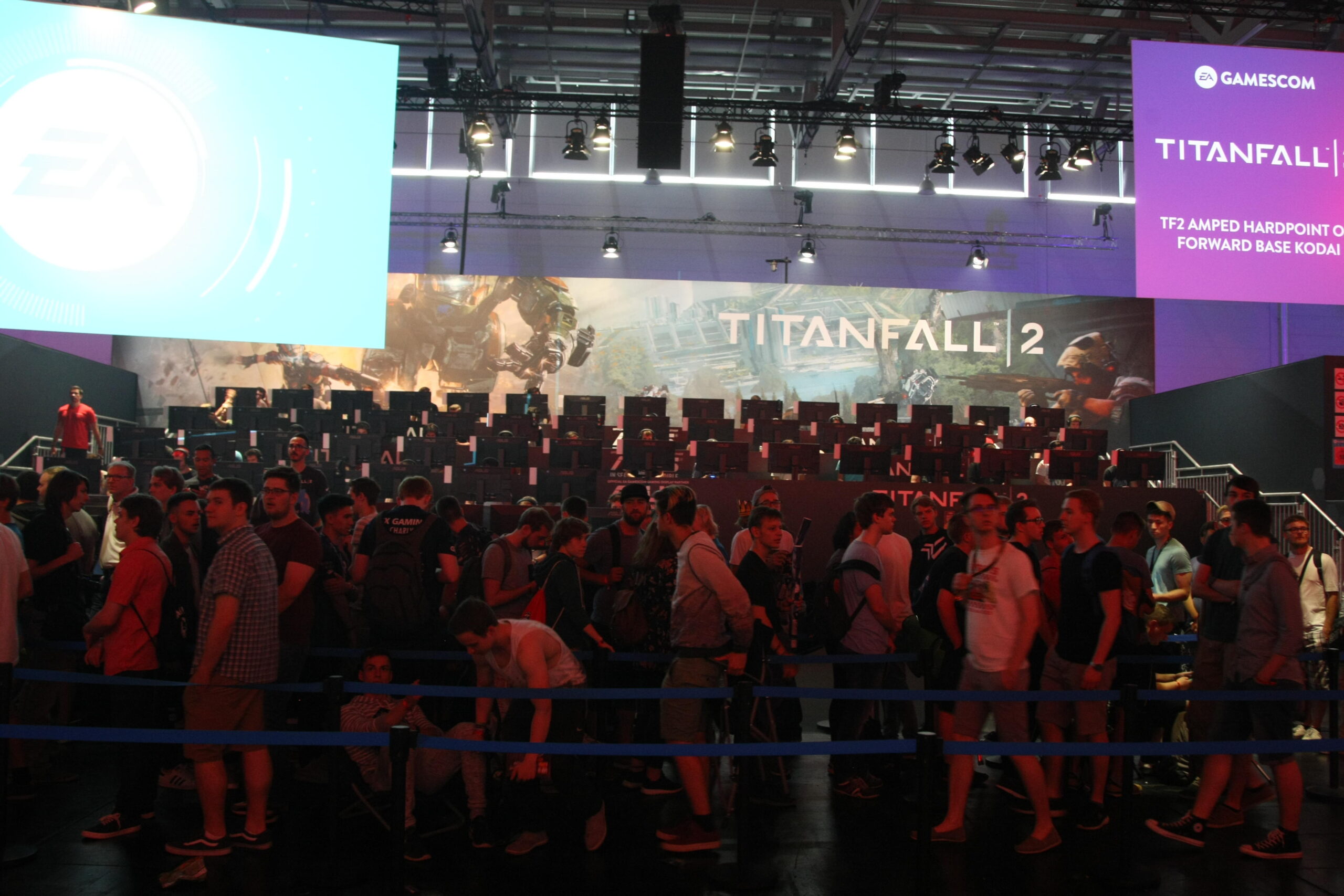 a gaming tournament for the game Titanfall 2 in a big venue with plenty of people watching it